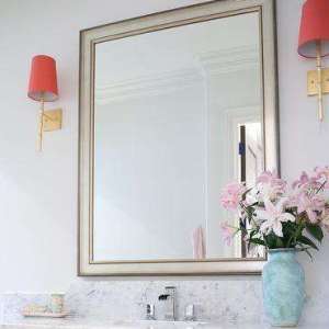 White and Gray Beveled Mirror with Brass Bamboo Sconces